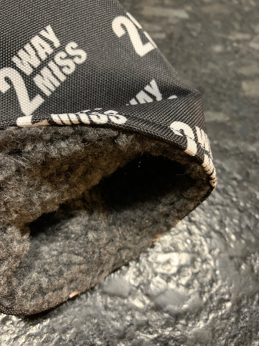 Fur material lining shown inside golf headcover